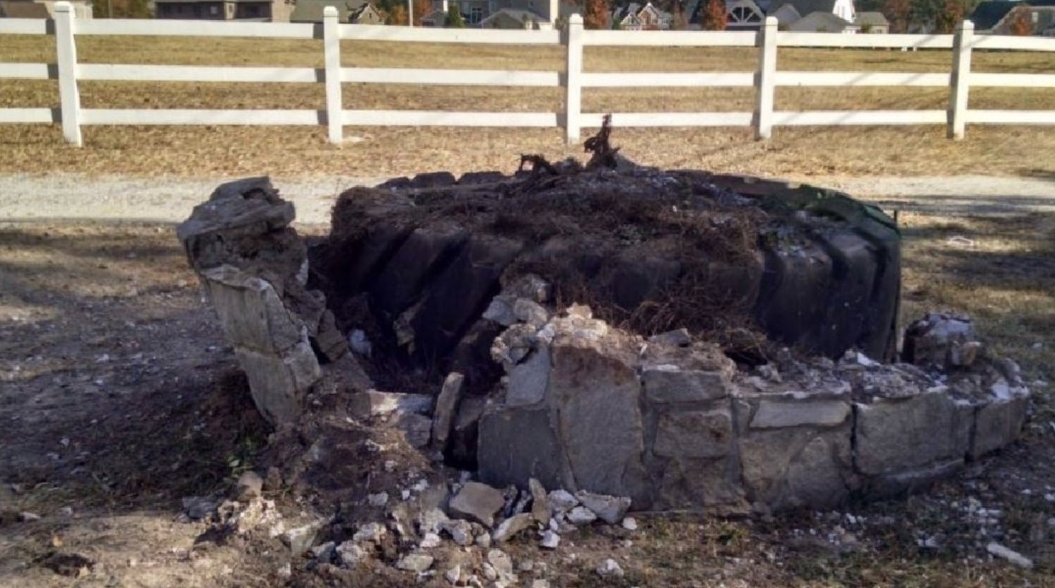 The stone and tire planter on Batesville Road, photographed after the crash